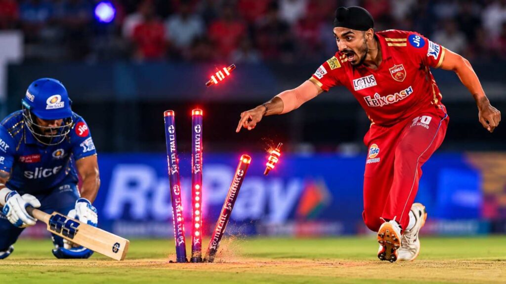 Arshdeep Singh breaking an expensive IPL LED stump during the 2023 match against Mumbai Indians