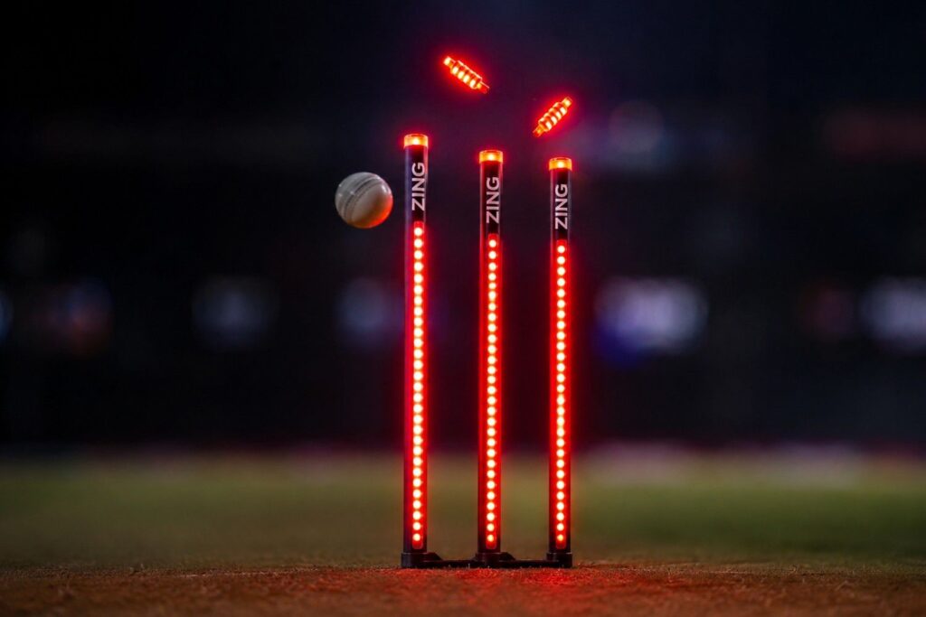 Zing International LED stumps and bails glowing after a wicket in IPL cricket