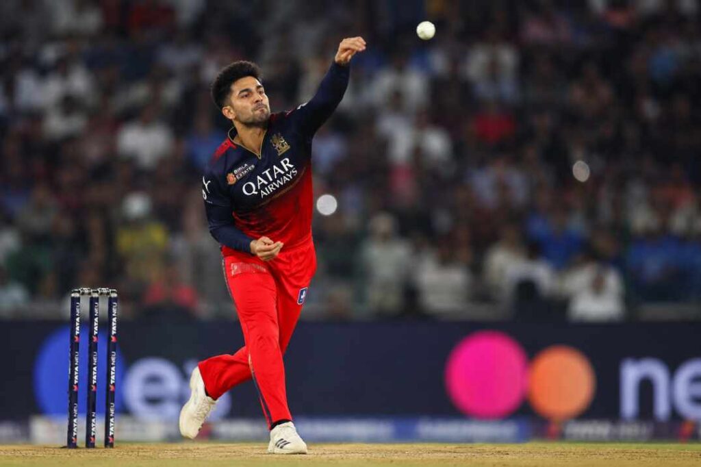 Rasikh Salam Dar bowling in IPL 2026 final, taking 3 wickets for 27 runs against Gujarat Titans